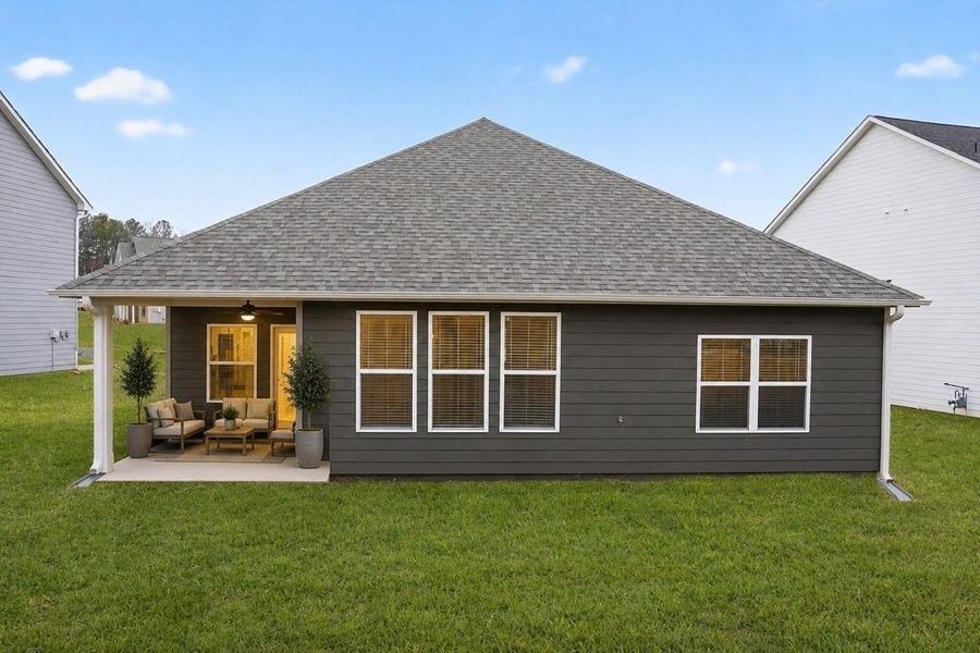 Exterior details and patio area of a home in The Fairways at Mirror Lake, Villa Rica (Image 28).