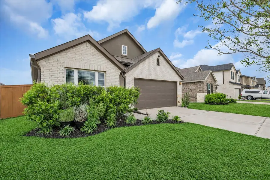 Front exterior of a new home in , Hockley, TX, highlighting curb appeal (Image 24). Front exterior of a new home in , Hockley, TX, highlighting curb appeal (Image 24).