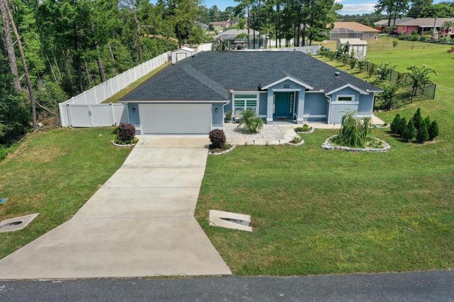 Front exterior of a new home in , Ocala, FL, highlighting curb appeal (Image 32). Front exterior of a new home in , Ocala, FL, highlighting curb appeal (Image 32).