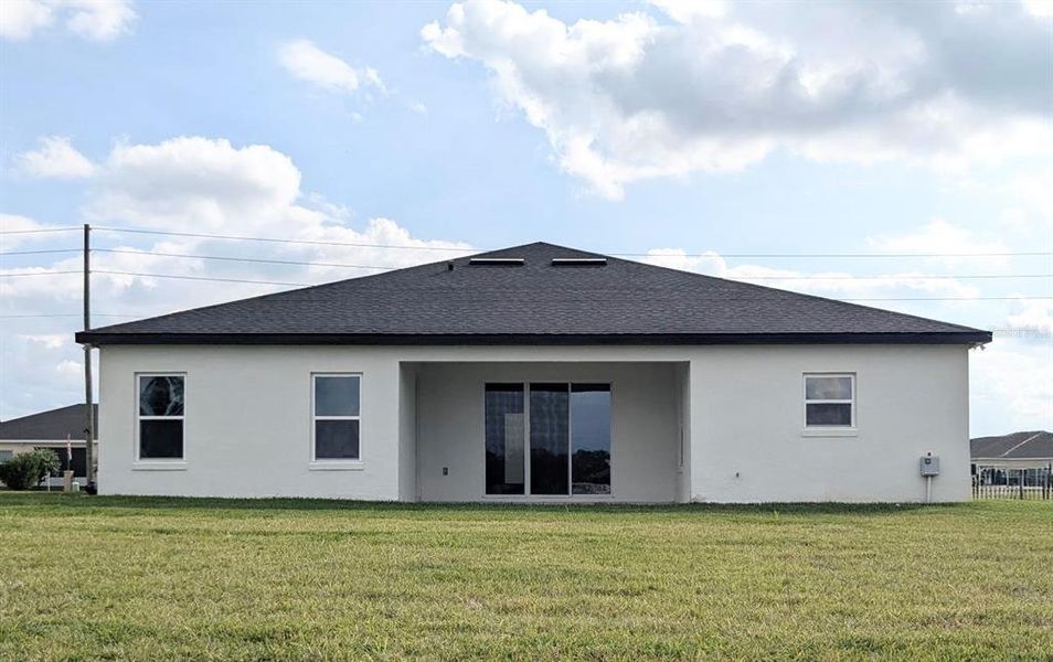 Exterior details and patio area of a home in , Sebring (Image 2).