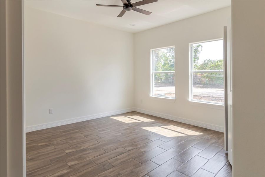 Bedroom three gets two windows and extra daylight, whether it stays a bedroom or clocks in as the home office. Bedroom three gets two windows and extra daylight, whether it stays a bedroom or clocks in as the home office.