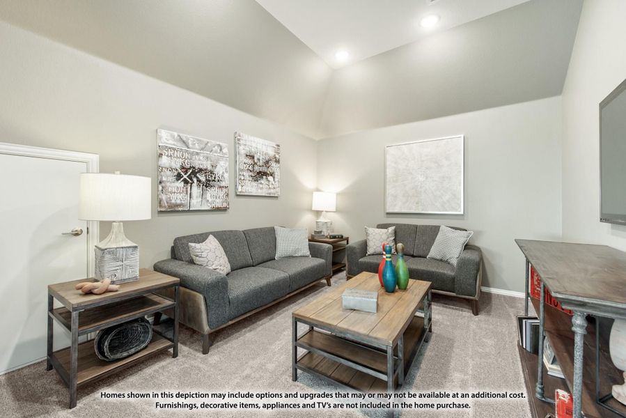Living room with vaulted ceiling, gray sofas, wood coffee table, and neutral carpet flooring