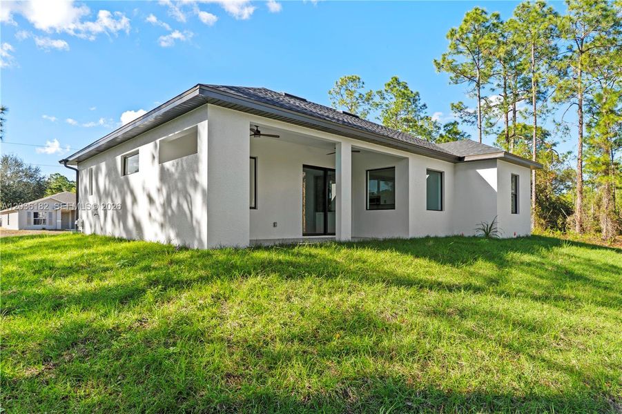 Exterior details and patio area of a home in , Lehigh Acres (Image 7).