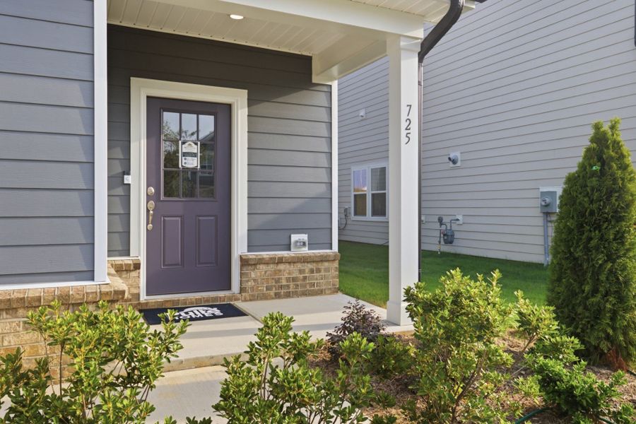 Exterior details and patio area of a home in Providence Oaks, Fuquay Varina (Image 3). Exterior details and patio area of a home in Providence Oaks, Fuquay Varina (Image 3).