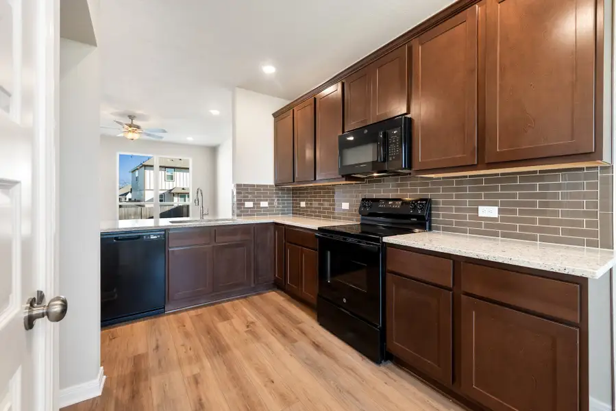 Furnished interior view inside a new home in Arroyo Ranch, Seguin (Image 4).