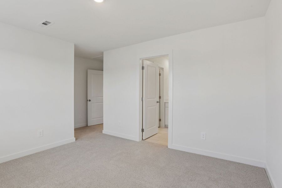 Spacious, unfurnished interior of a new home in Greystone - Highland Townhomes, Smyrna (Image 13).