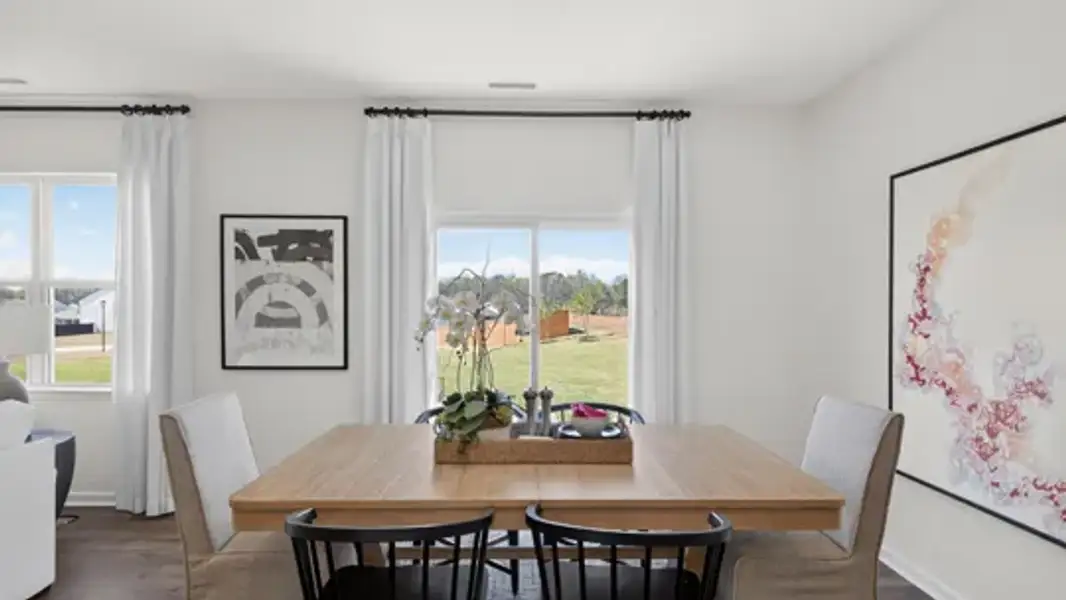 Representative furnished interior of a home built from the Hayden by D.R. Horton in Porters Landing, Wendell (Image 12).