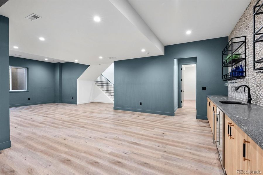 Ample space for games, movies, rec with wet bar