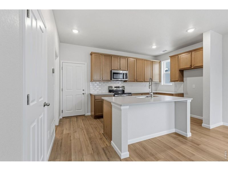 Furnished interior view inside a new home in Spring Valley, Longmont (Image 4).