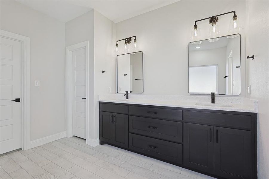 Bathroom featuring vanity