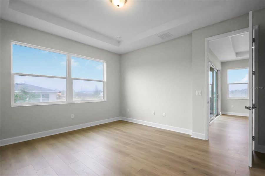 Spacious, unfurnished interior of a new home in Cresswind at Hammock Oaks, Lady Lake (Image 40).