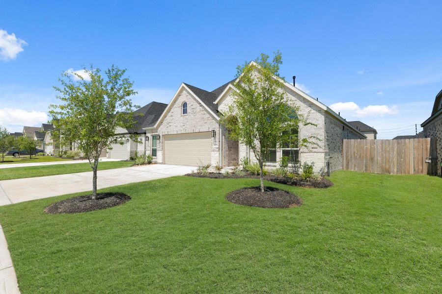 Front exterior of a new home in Briarwood Crossing, Rosenberg, TX, highlighting curb appeal (Image 20).