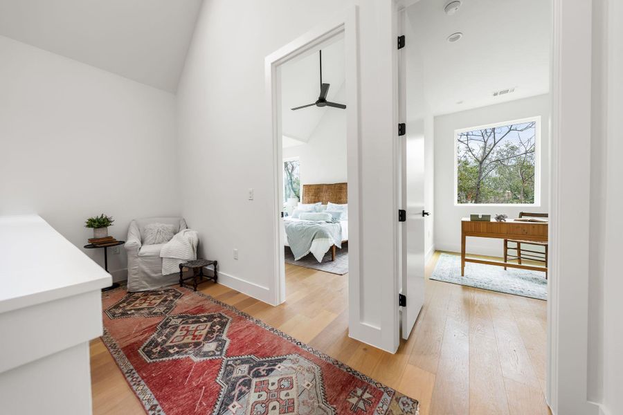 Landing area in front of primary bedroom would be a great reading nook or small office