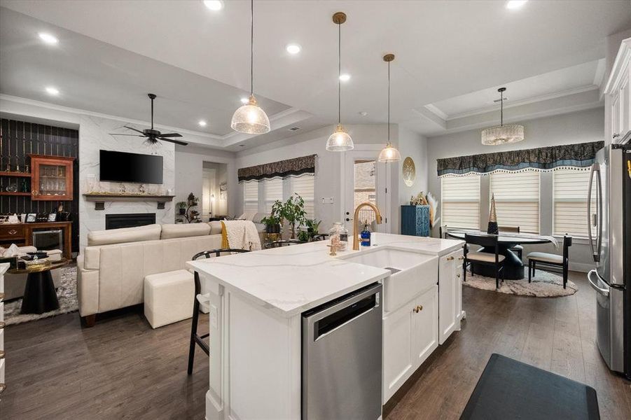 Quartz countertops, new dishwasher, customized electric window coverings