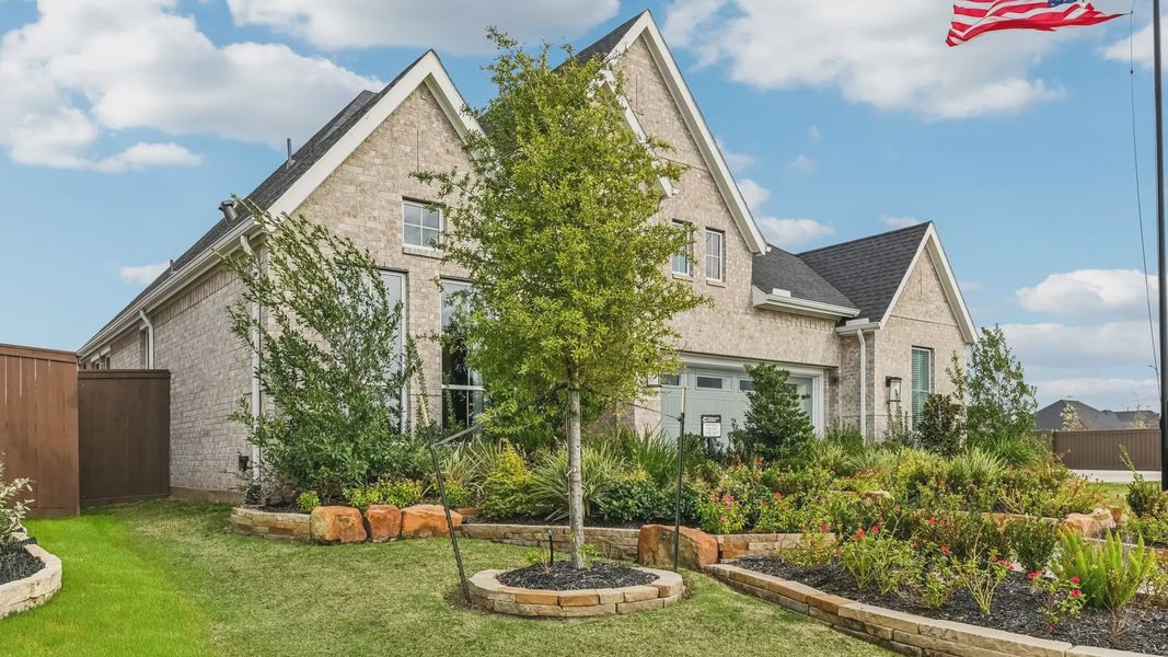Representative exterior photo of a completed home built from the Sweetwater by Chesmar Homes in Briarley, Montgomery, TX (Image 23).