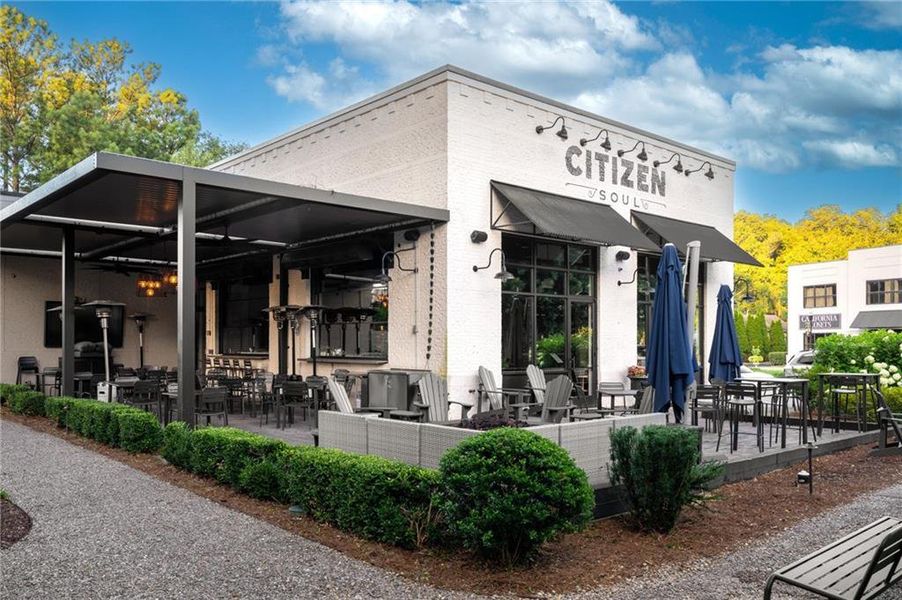 Front exterior of a new home in Echo at Crabapple, Milton, GA, highlighting curb appeal (Image 1). Front exterior of a new home in Echo at Crabapple, Milton, GA, highlighting curb appeal (Image 1).