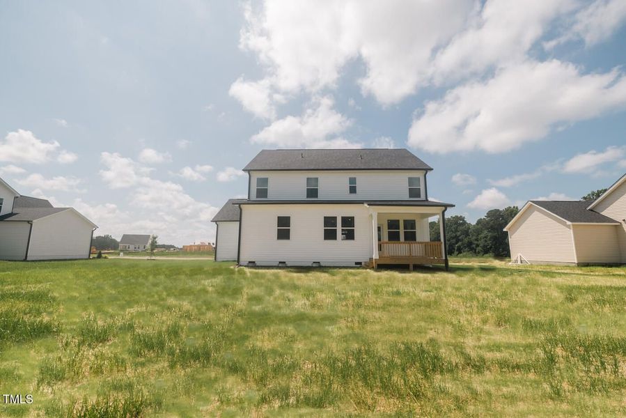 Front exterior of a new home in Tobacco Road, Angier, NC, highlighting curb appeal (Image 135). Front exterior of a new home in Tobacco Road, Angier, NC, highlighting curb appeal (Image 135).