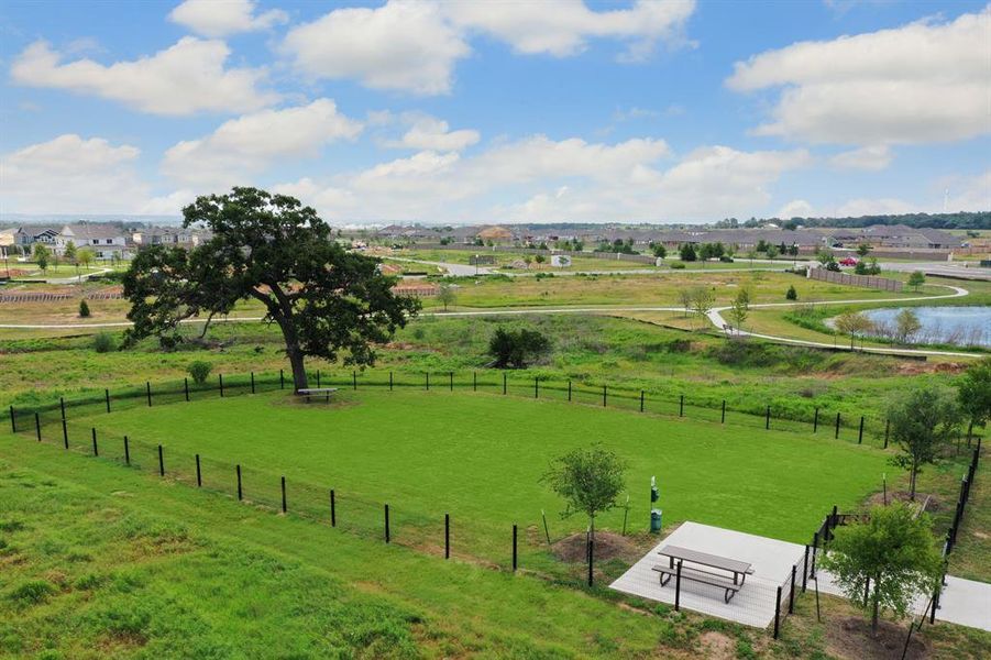 Clean dog park located in the neighborhood