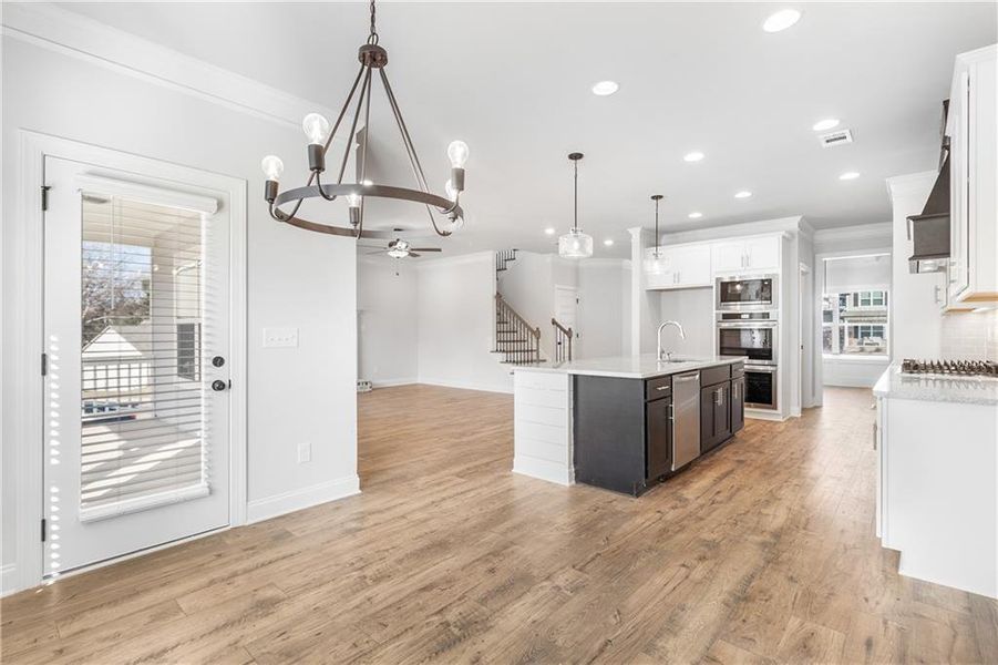 Furnished interior view inside a new home in Calgary Downs, Winder (Image 9).