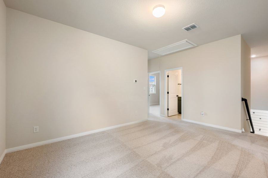 Representative unfurnished interior of a home built from the Robin by Ashton Woods in The Cottages at Lariat, Liberty Hill (Image 40). Representative unfurnished interior of a home built from the Robin by Ashton Woods in The Cottages at Lariat, Liberty Hill (Image 40).