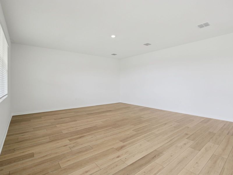 Spacious, unfurnished interior of a new home in Coasterra - Reserve Series, Palmetto (Image 14).