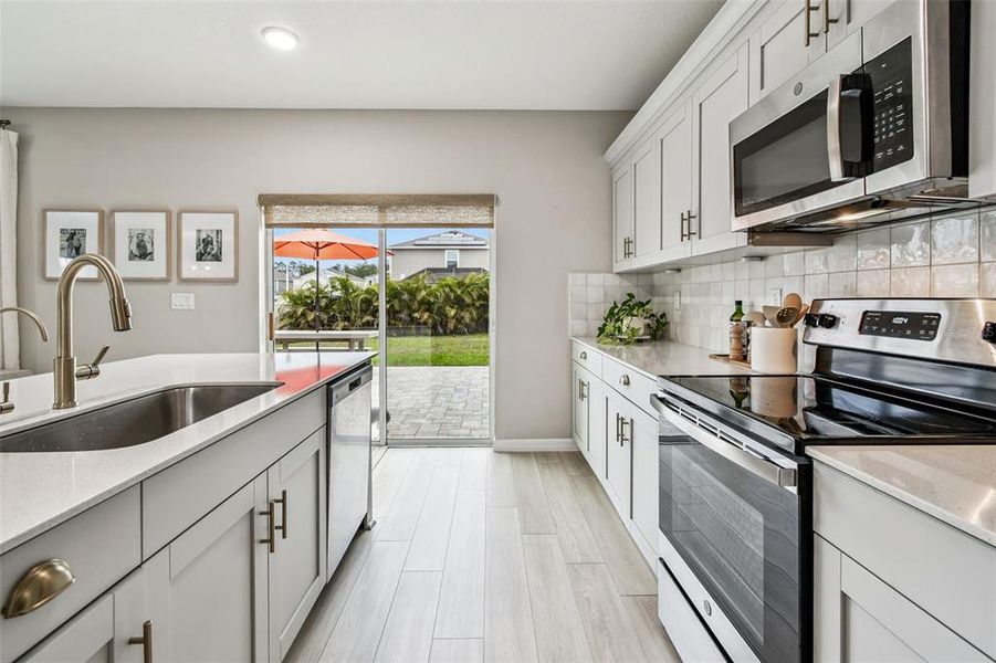 Furnished interior view inside a new home in Pasadena Point, Wesley Chapel (Image 18).