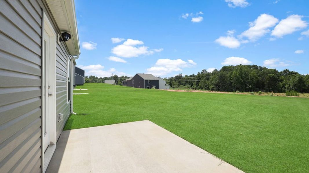 Exterior details and patio area of a home in Harper Ridge, Roebuck (Image 20). Exterior details and patio area of a home in Harper Ridge, Roebuck (Image 20).