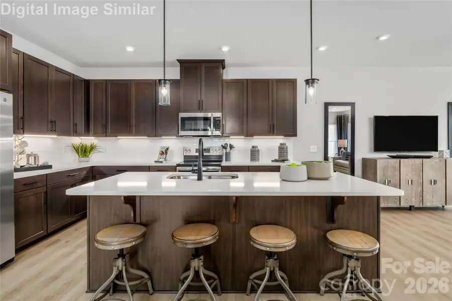 Step Into A Space Where Culinary Creativity Meets Effortless Hosting.  This Kitchen Wasn't Just Built For Cooking - It Was Designed To Be The Heart Of the Party.