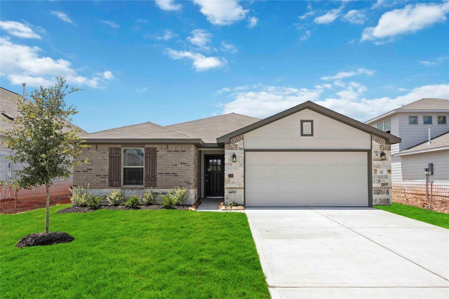 Front exterior of a new home in The Villages at Westpointe, Dayton, TX, highlighting curb appeal (Image 2). Front exterior of a new home in The Villages at Westpointe, Dayton, TX, highlighting curb appeal (Image 2).