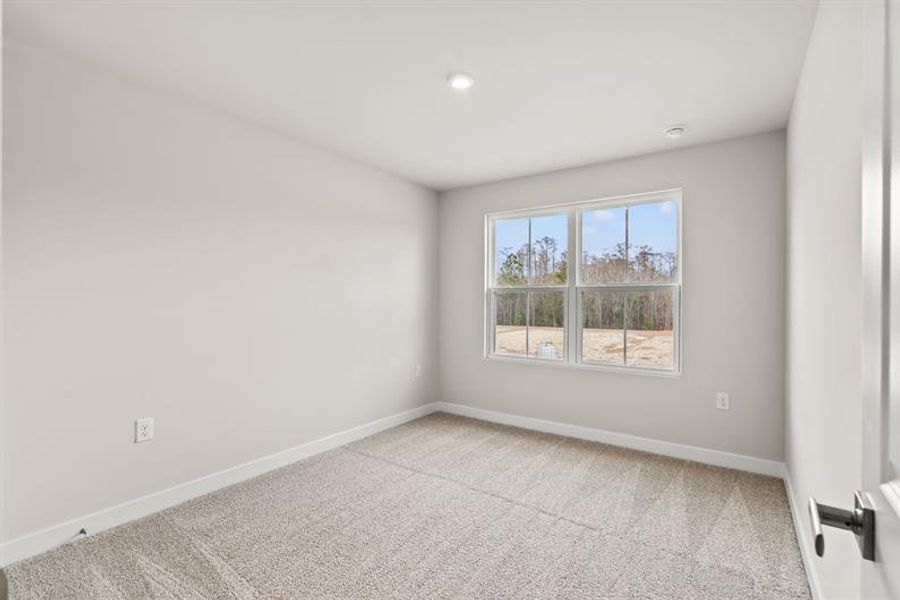 Spacious, unfurnished interior of a new home in Lakes at Riverbend, Navassa (Image 15).
