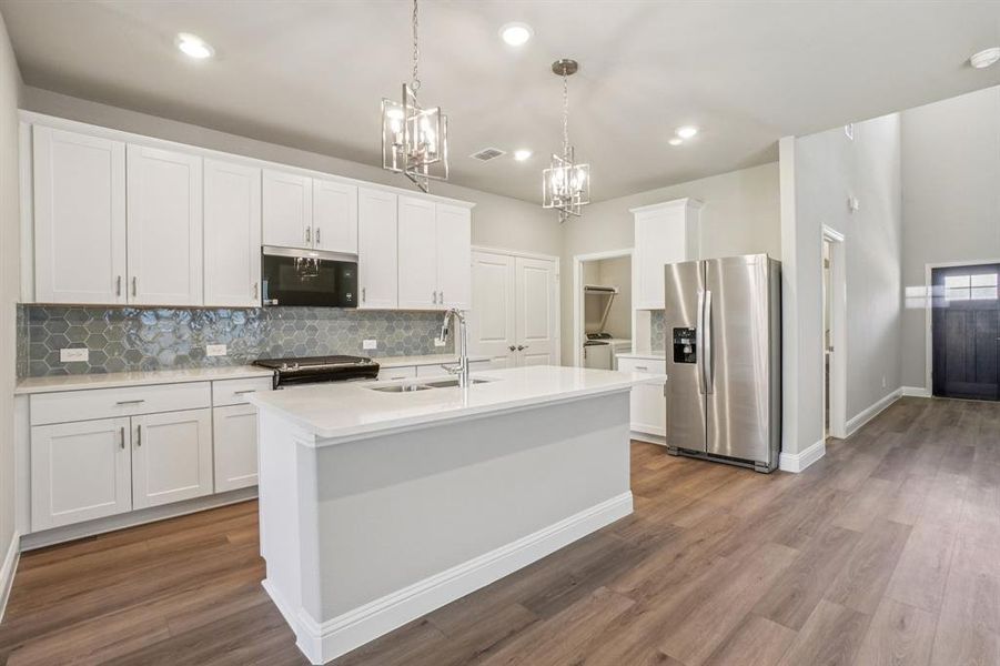 Furnished interior view inside a new home in Simpson Crossing - Spring Series, McKinney (Image 10).