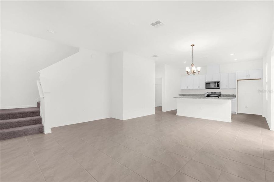 Spacious, unfurnished interior of a new home in Bellaviva III at Westside, Davenport (Image 14).