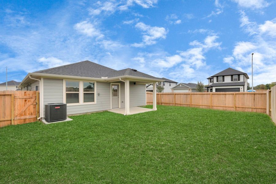 Exterior details and patio area of a home in Montgomery Ridge: Landmark Collection, Montgomery (Image 2). Exterior details and patio area of a home in Montgomery Ridge: Landmark Collection, Montgomery (Image 2).