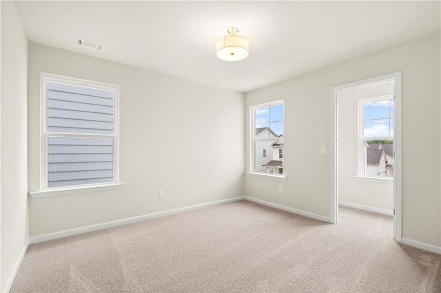 Spacious, unfurnished interior of a new home in The Village at Shallowford, Kennesaw (Image 29).