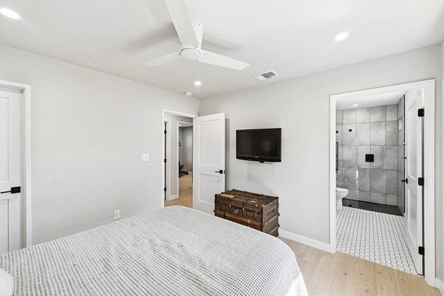Bedroom with recessed lighting, a ceiling fan, and light wood finished floors