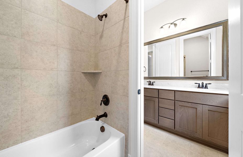 Representative furnished interior of a home built from the 2500 by Ravenna Homes in The Highlands 55′, Porter (Image 15). Representative furnished interior of a home built from the 2500 by Ravenna Homes in The Highlands 55′, Porter (Image 15).