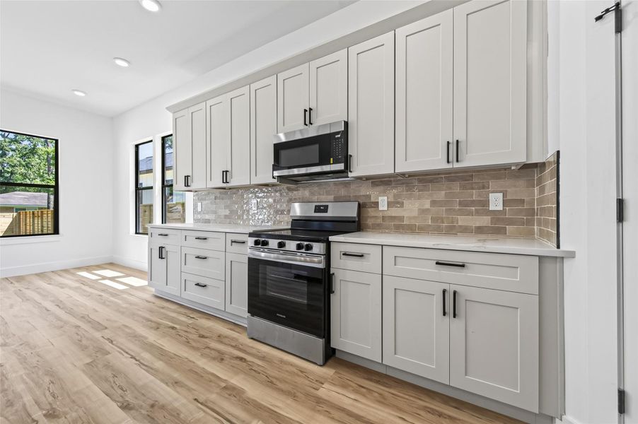 Furnished interior view inside a new home in , Conroe (Image 34).