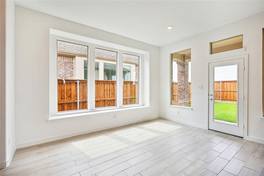 Spare room featuring light hardwood / wood-style floors