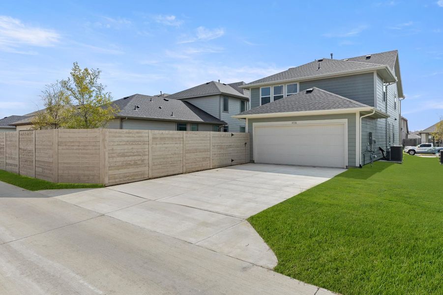 Front exterior of a new home in Painted Tree, McKinney, TX, highlighting curb appeal (Image 17).