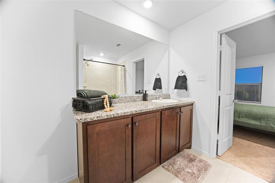 Furnished interior view inside a new home in Mobberly Farms: Watermill Collection, Pilot Point (Image 15).