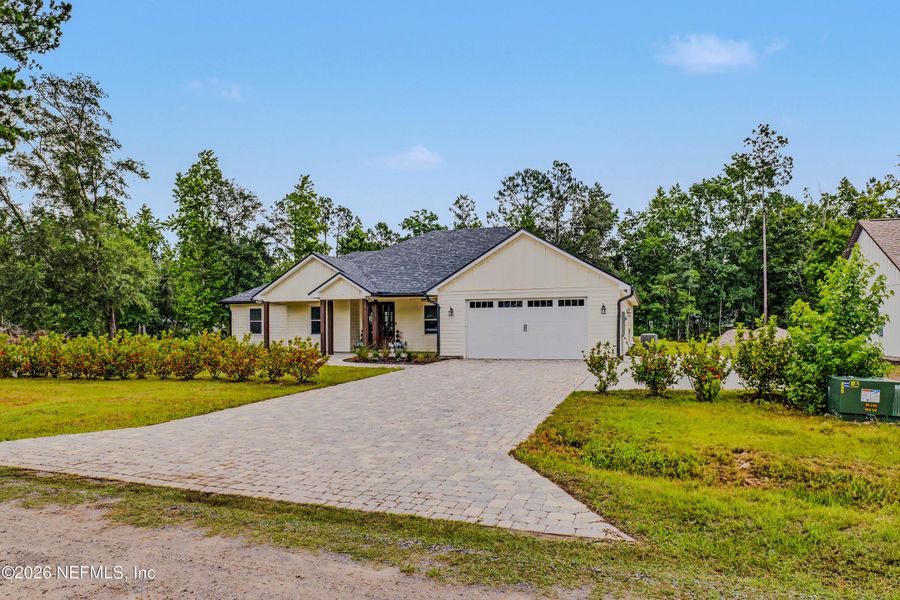 Front exterior of a new home in , Callahan, FL, highlighting curb appeal (Image 28).