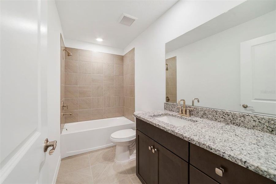 Furnished interior view inside a new home in Towns at Greenleaf, Oviedo (Image 10).