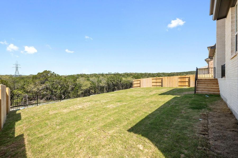 View of yard featuring a fenced backyard View of yard featuring a fenced backyard