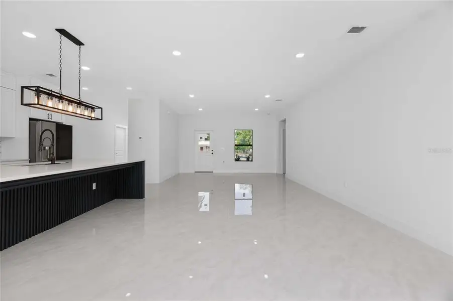 Spacious, unfurnished interior of a new home in , Port Charlotte (Image 63).