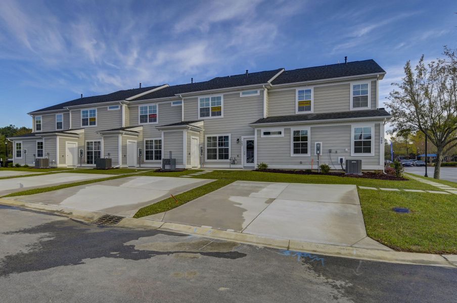 Front exterior of a new home in Lake Carolina Townhomes, Columbia, SC, highlighting curb appeal (Image 23).