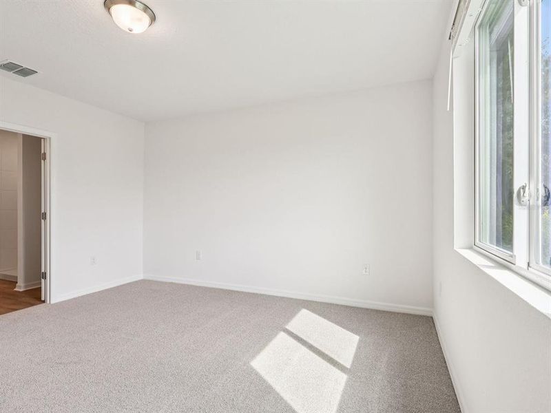 Spacious, unfurnished interior of a new home in Salt Meadows - Classic Series, Parrish (Image 18).