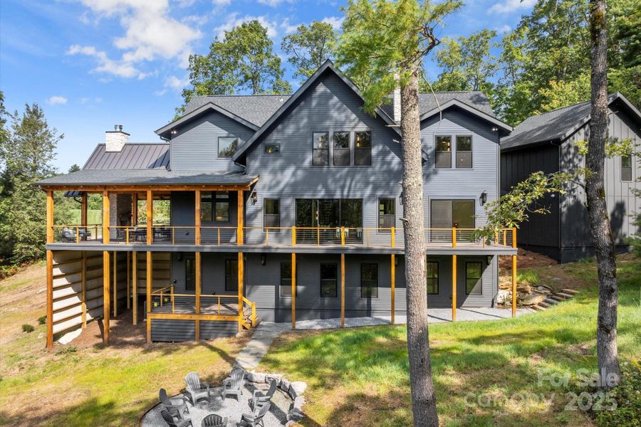 Front exterior of a new home in , Cashiers, NC, highlighting curb appeal (Image 1).