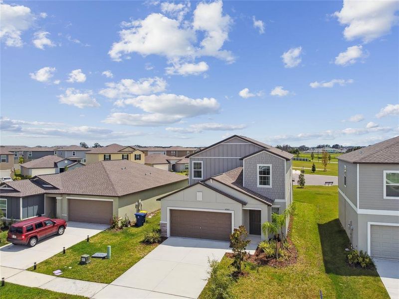 Front exterior of a new home in , San Antonio, FL, highlighting curb appeal (Image 24).