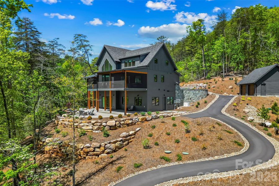 Front exterior of a new home in , Marion, NC, highlighting curb appeal (Image 26).