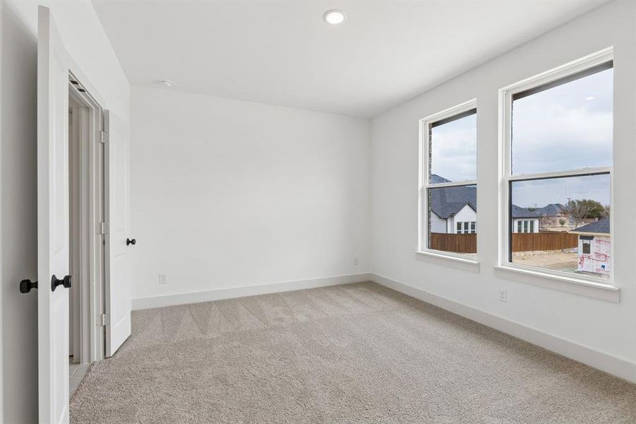 You'll find nicely sized secondary bedrooms in our Colton plan.